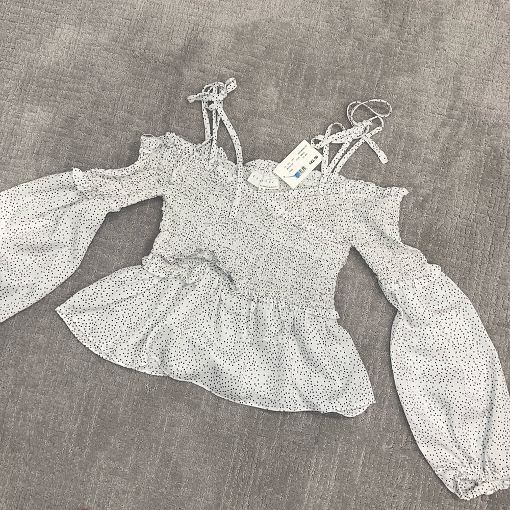Black and white polka dot blouse